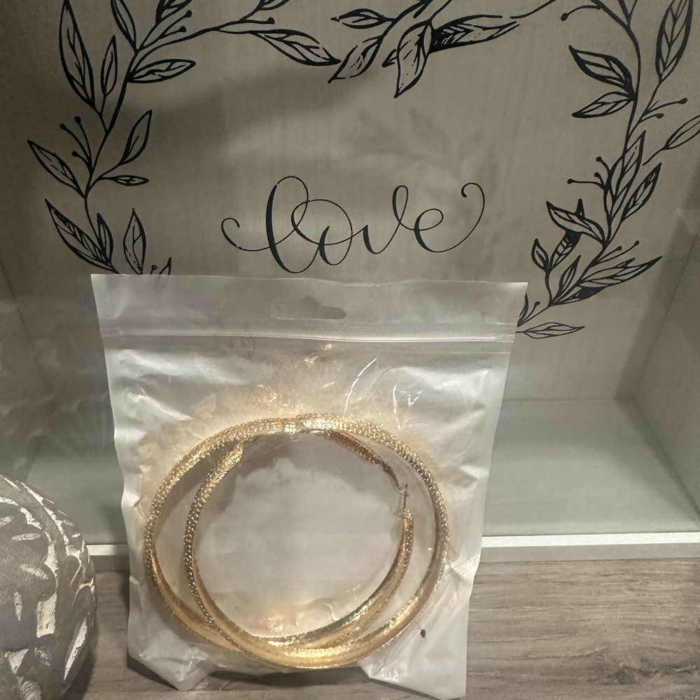 Huge LARGE gold tone hoop pierced earrings! New in package! Super lightweight!!